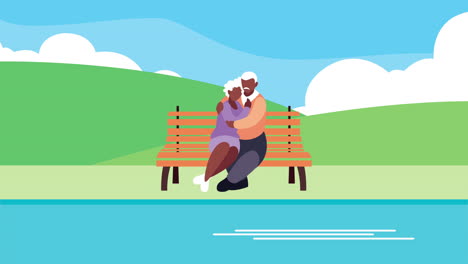 afro grandparents couple hugging in the park chair