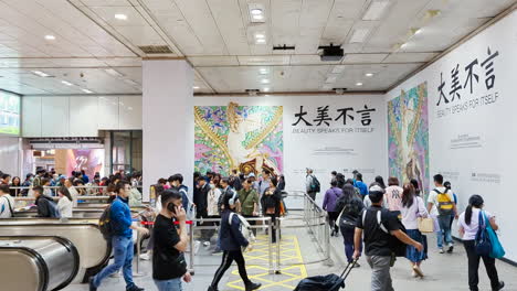 the motion of commuters walking inside mrt station during rush hour in taipei taiwan with 4k resolution