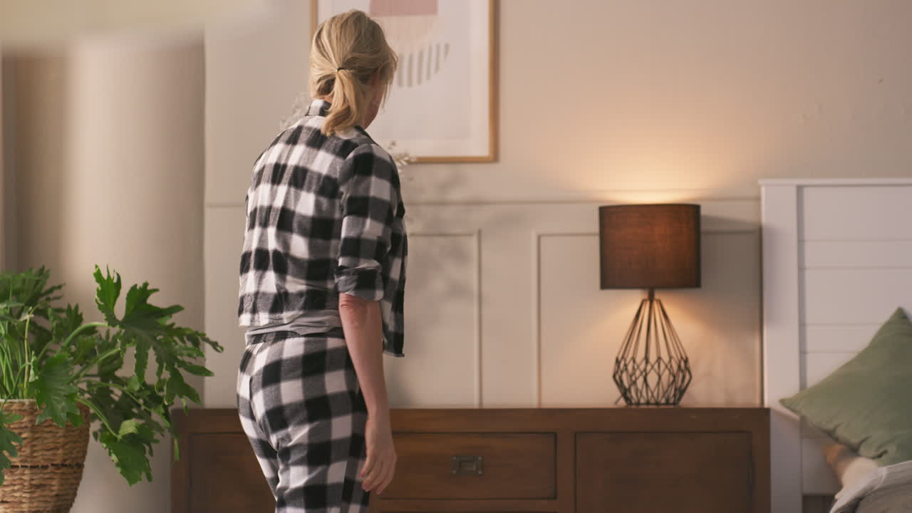 Bedroom Scene with Woman and Decor