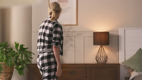 Bedroom Scene with Woman and Decor