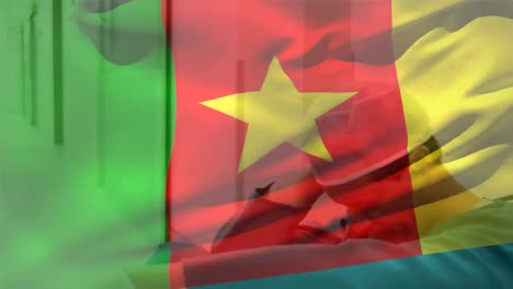 Digital-composition-of-cameroon-flag-waving-against-stressed-caucasian-male-surgeon-at-hospital