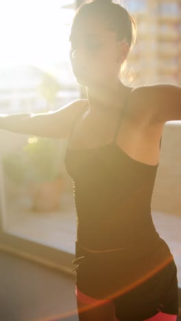woman stretching in gym