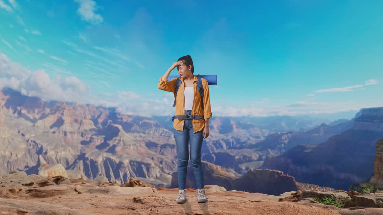 Full Body Of Asian Female Hiker With Mountaineering Backpack Having A Headache While Traveling At The Top Of Mountain