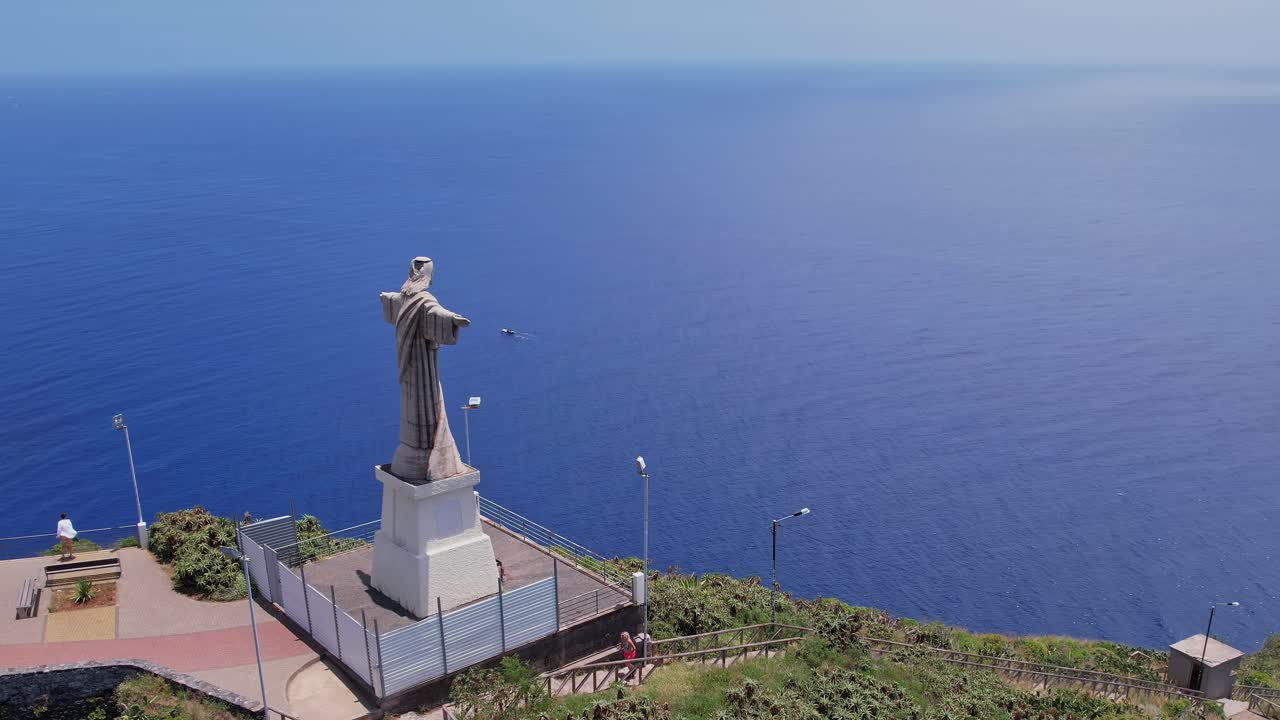 Explore the scenic view of Cristo Rei in Madeira, Portugal from above
