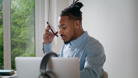 contemporary arranger speaking mobile home closeup. man recording voice message