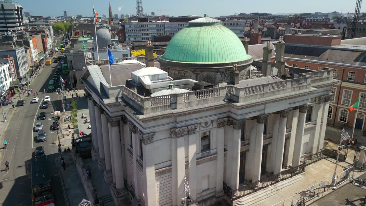 Reversing aerial video of Dublin City Hall in the Temple Bar area of Dublin, Leinster, in Ireland on a bright and sunny day. Filmed in 4K, 60FPS and with Rec709 color.