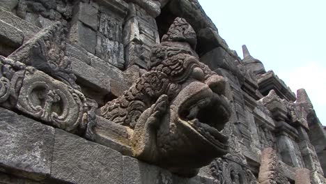 Dragon-head-statue-at-Borobudur-Temple,-UNESCO-World-Heritage-Site,-Central-Java,-Indonesia,-Buddhist-Temple