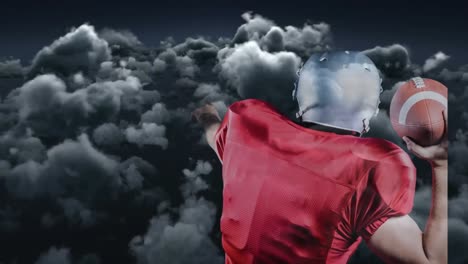 animation of rear view of male rugby player throwing the ball against copy space on dark clouds