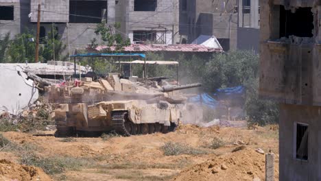 israeli tank concealed by buildings in rafah palestine rotating its turret