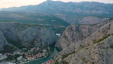 croatian omis coastal town, tourist destination, sunset aerial view