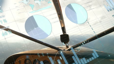 graphs and charts animation over cockpit view of flying airplane