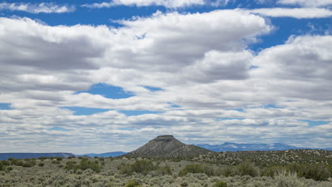 timelapse clouds around cone shaped mountain