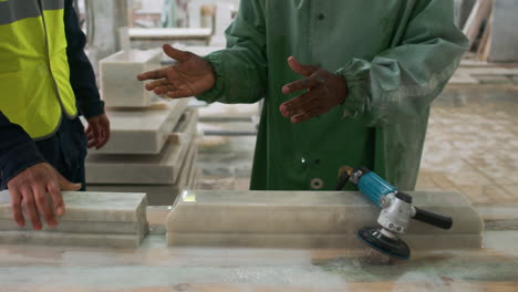 people working with marble