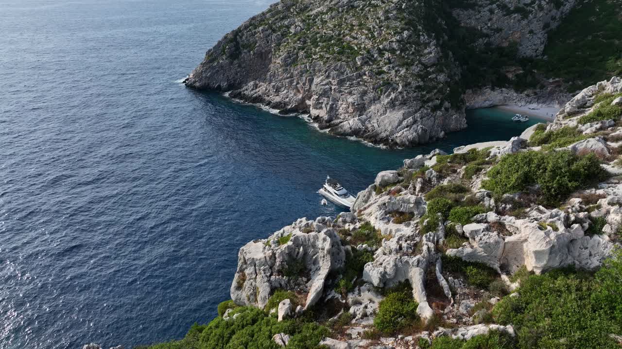 Aerial View Of Yacht Floating In The Sea Seen From Rocky Mountain In Shpella, Albania.