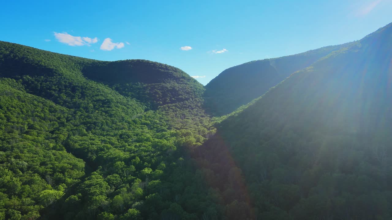 Aerial drone video footage of summer time in the Catskill Mountains in New York’s Hudson Valley. The Catskills are a sub-range of the Appalachian Mountains on the east coast of the United States.