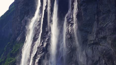 a breathtaking view of the seven sisters waterfalls in the geiranger fjord, norway