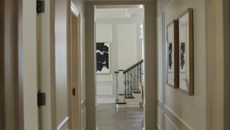 hallway in luxury apartment building looks out to stairs