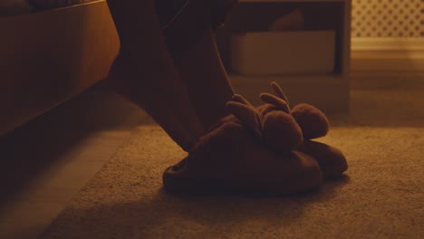 putting on slippers at night