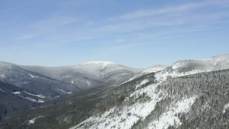 jeseniky mountain range in czechia under snow on a sunny winter day