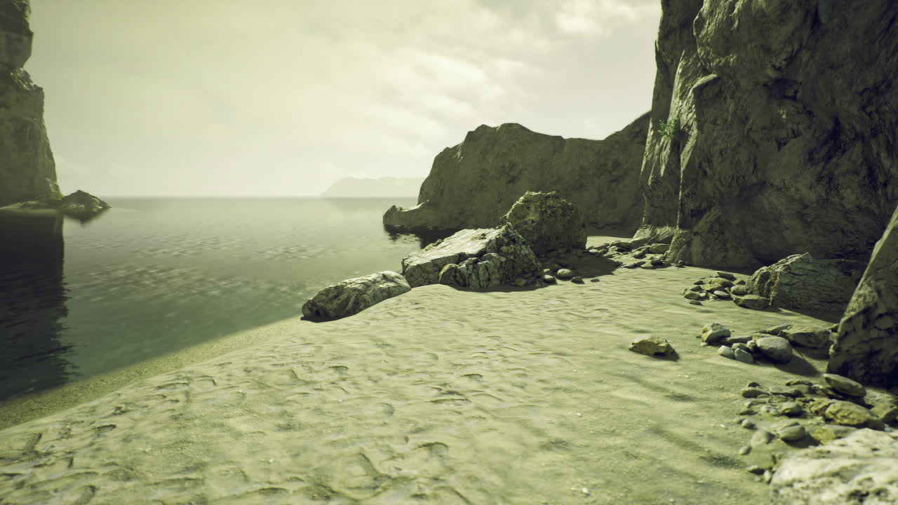 Tranquil morning scene along rocky shores shrouded in foggy atmosphere