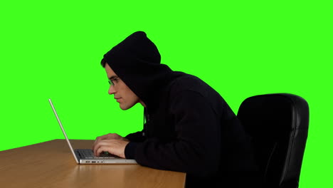 hacker typing at his desk