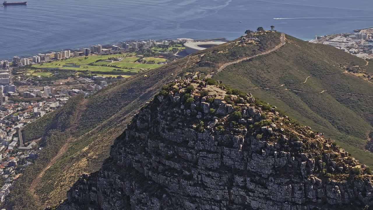 Cape Town South Africa Aerial v30 zoomed birds eye view flyover Signal Hill around Lion's head summit capturing the waterfront cityscape and ocean - Shot with Mavic 3 Pro Cine - Jan 11th 2024