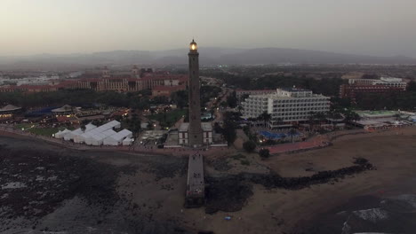 maspalomas lighthouse and resort on the coast aerial