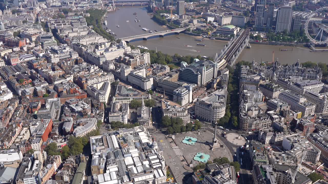 Aerial view of Trafalgar Square and Nelson's Column including views to the Thames River and The City of London