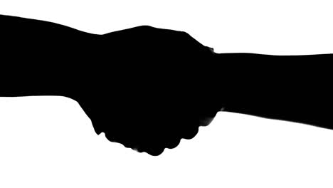 shaking hands of two people silhouette isolated on white