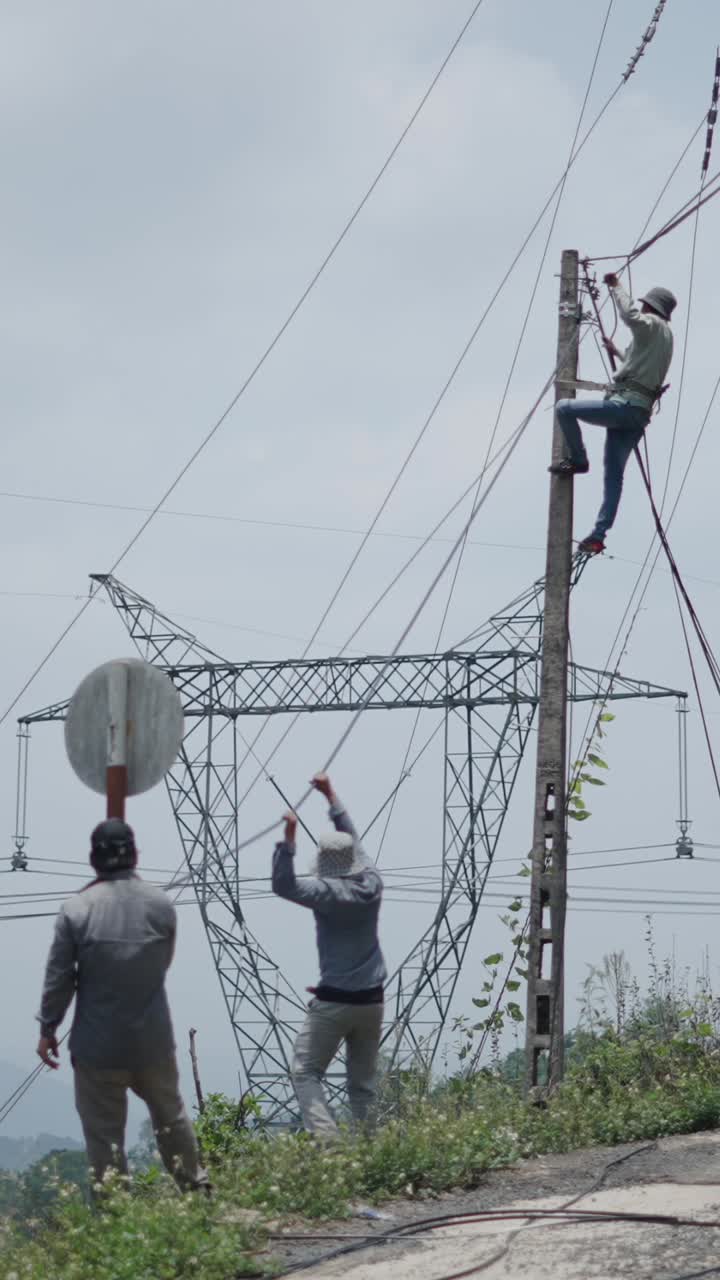 Linemen working on power lines
