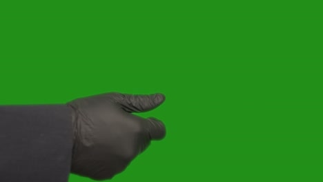 A man in gloves hands a bundle of banknotes to a woman, chroma key