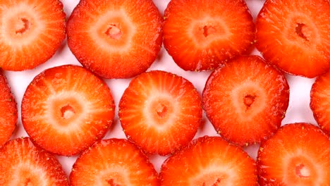 rotating background of sliced strawberry