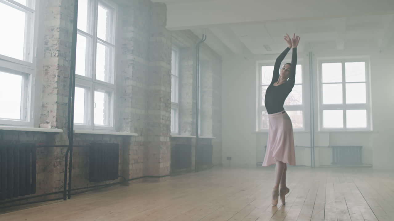 Young Ballerina Dancing In Empty Choreography Class