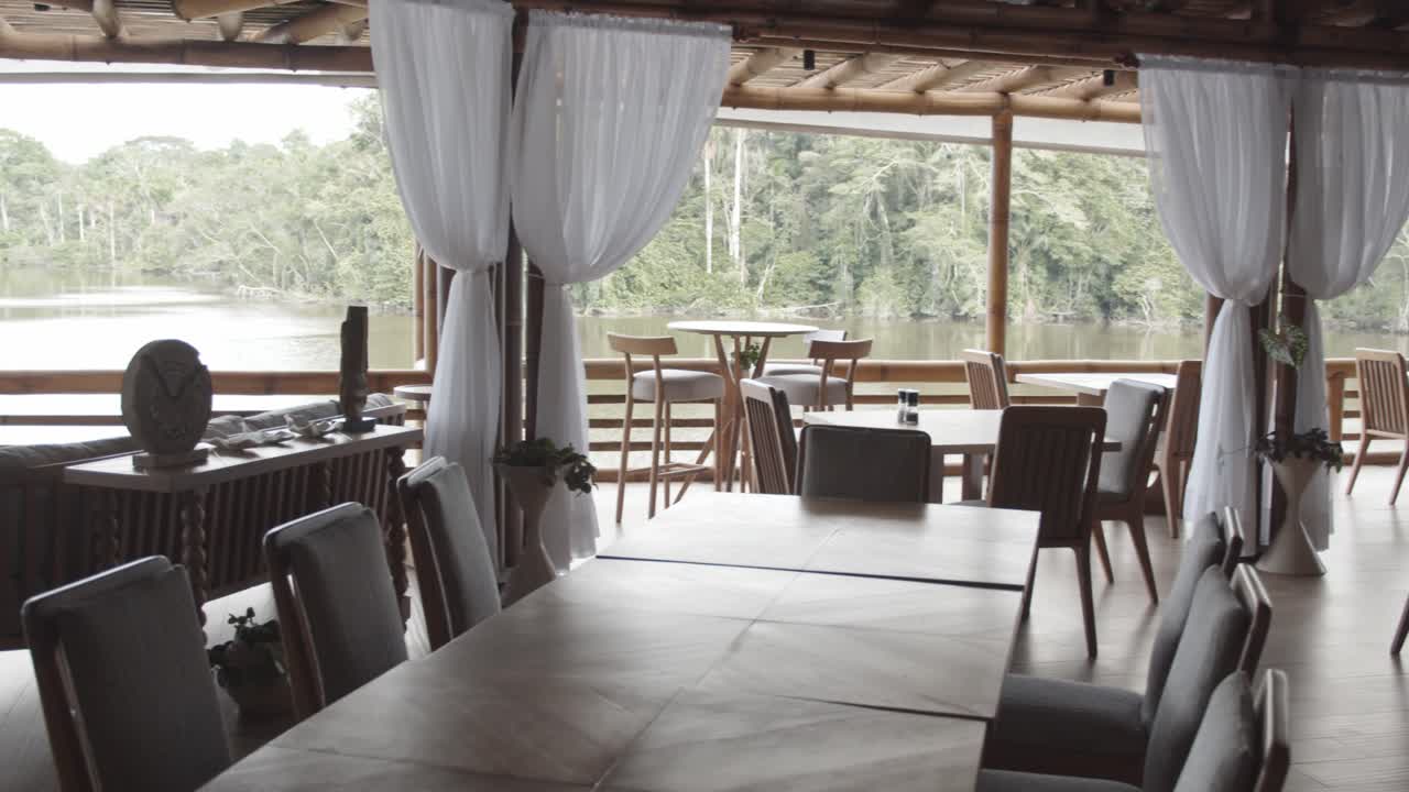 Stunning dinner room in luxury eco lodge in amazon rainforest Peru