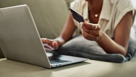 credit card, hands or woman in home with laptop