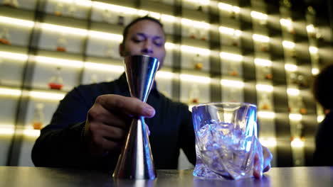 bartender preparing a cocktail