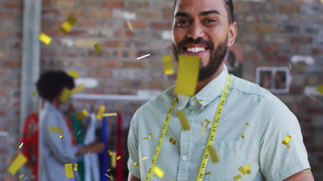 Man measuring garments standing in fashion studio, floating confetti icons around clothing rack