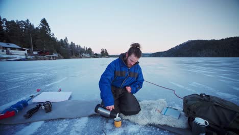 Male-Hiker-Pouring-Hot-Tea-Into-A-Cup