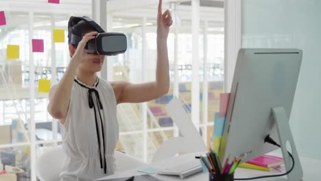 young woman working in a creative office