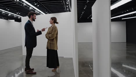 business people in an art gallery