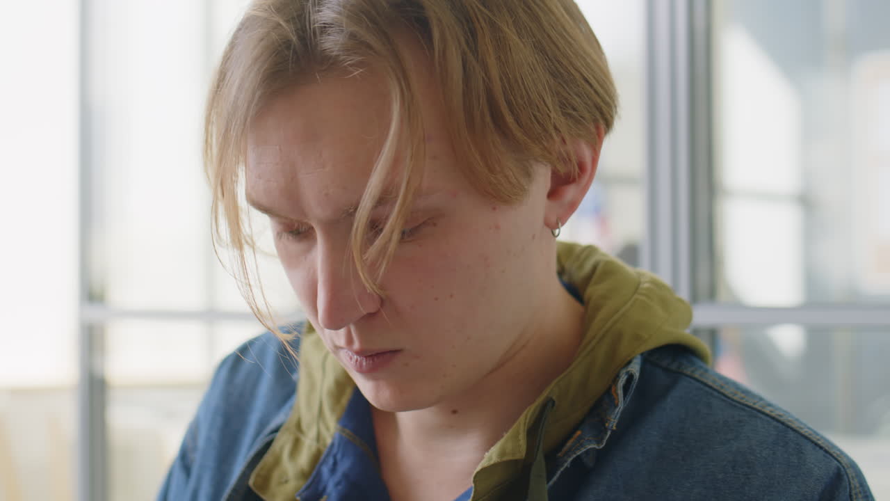 Young adult working on a laptop