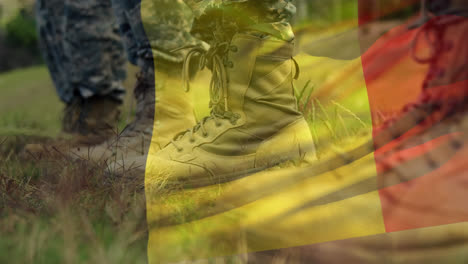 animation of flag of belgium waving over soldiers boots