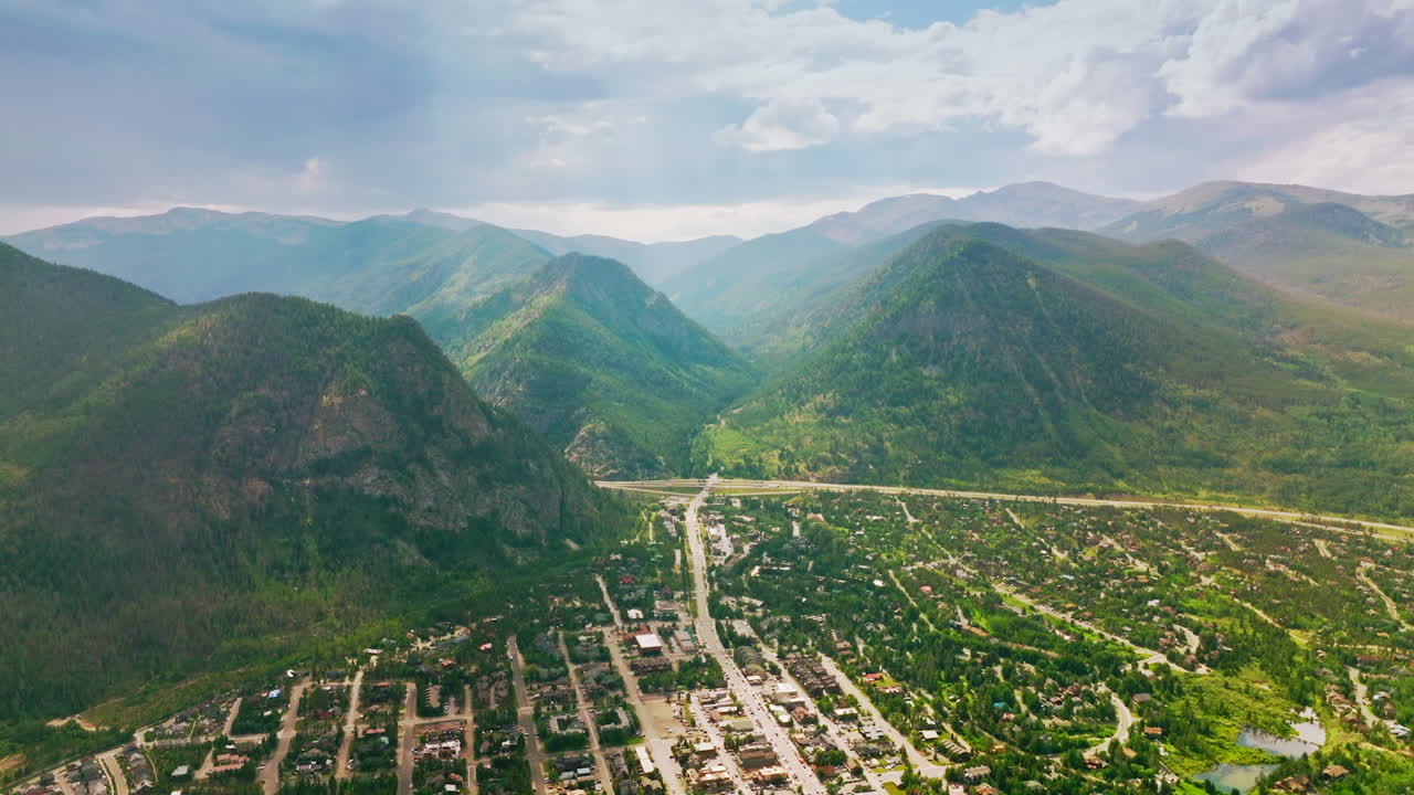 Picturesque resort city located at the foot of amazing mountains. Scenic aerial view of Aspen city in Colorado state, USA.
