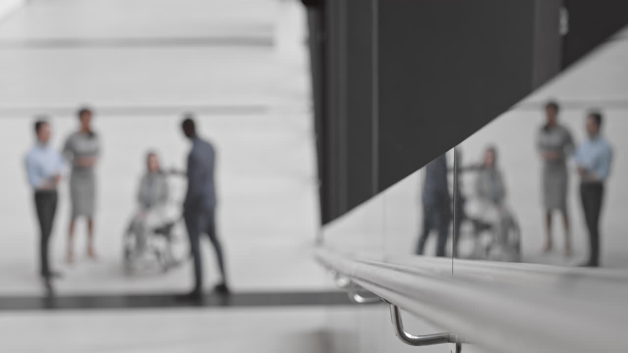 Four Diverse Colleagues Having Chat in Office