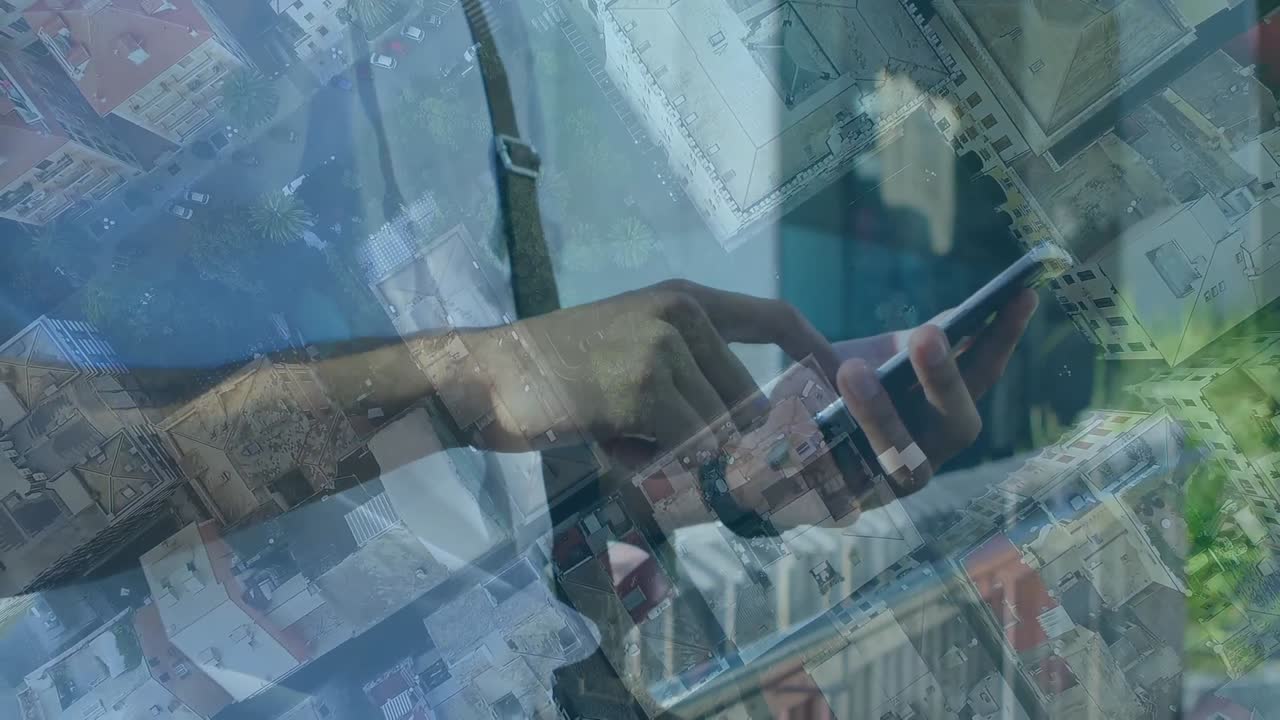 Animation of man using smartphone over cityscape