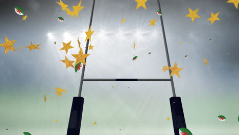 animazione di stelle su palle da rugby colorate con la bandiera del galles che cadono allo stadio