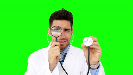 Young-doctor-looking-through-magnifying-glass