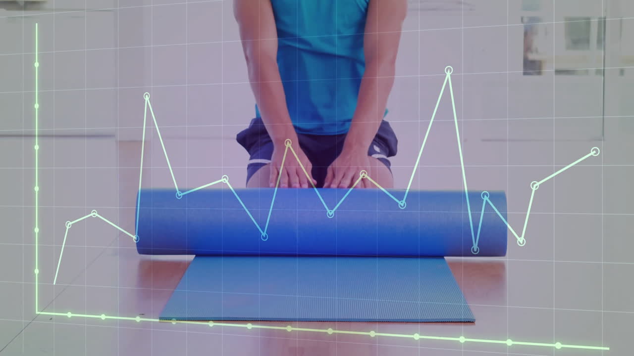 man kneeling behind foam roller on yoga mat, tracking fitness with neon green cyan digital graph