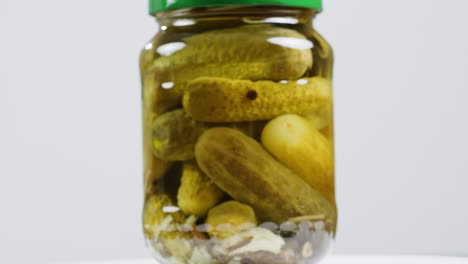 pickled cucumbers in a glass jar