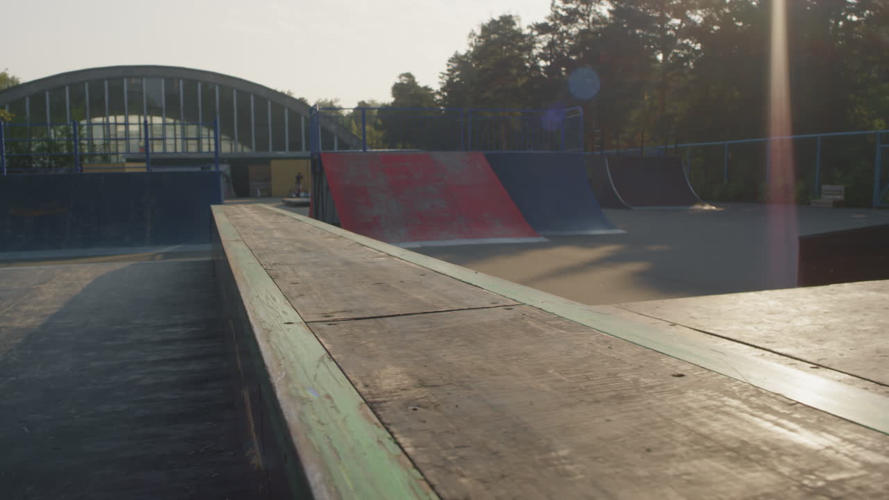 Teenager Rubbricking Ledge in Skatepark
